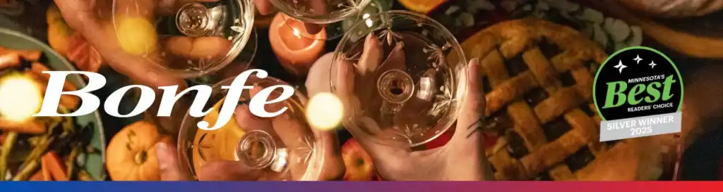 Bonfe team members and customers toast together over a festive table set with food and pie, celebrating their achievement as Minnesota’s Best Reader’s Choice 2023 Silver Winner. The “Bonfe” logo and “Bonus Bonfe Insider” badge are proudly displayed, highlighting the recognition this November 2025.