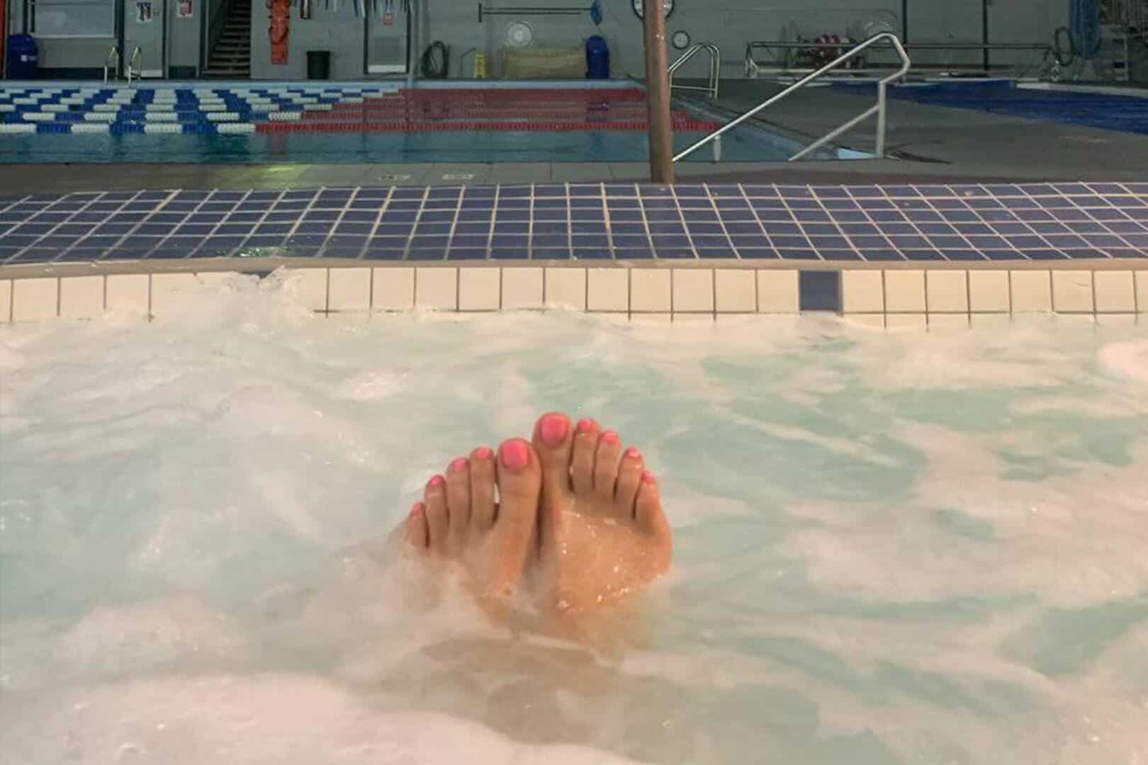Relaxing at Bay-O-Vista Swim & Tennis Club pool, enjoying leisure time in a clean, inviting environment with professional facilities perfect for family fun and swimming enthusiasts.