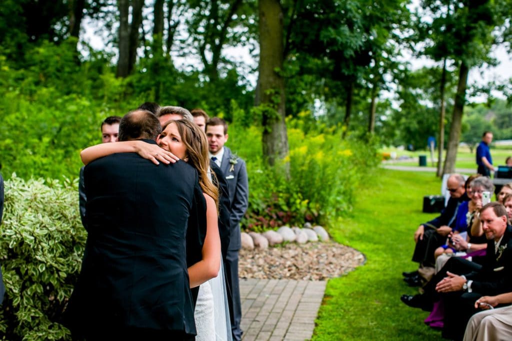 Drugans wedding A bride and groom sharing a moody embrace during their wedding ceremony.