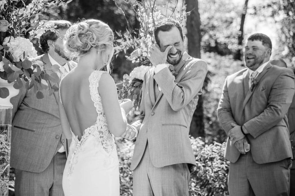 Drugans Wedding La Crosse WI Wedding Photographer captures joyful newlyweds during their ceremony.