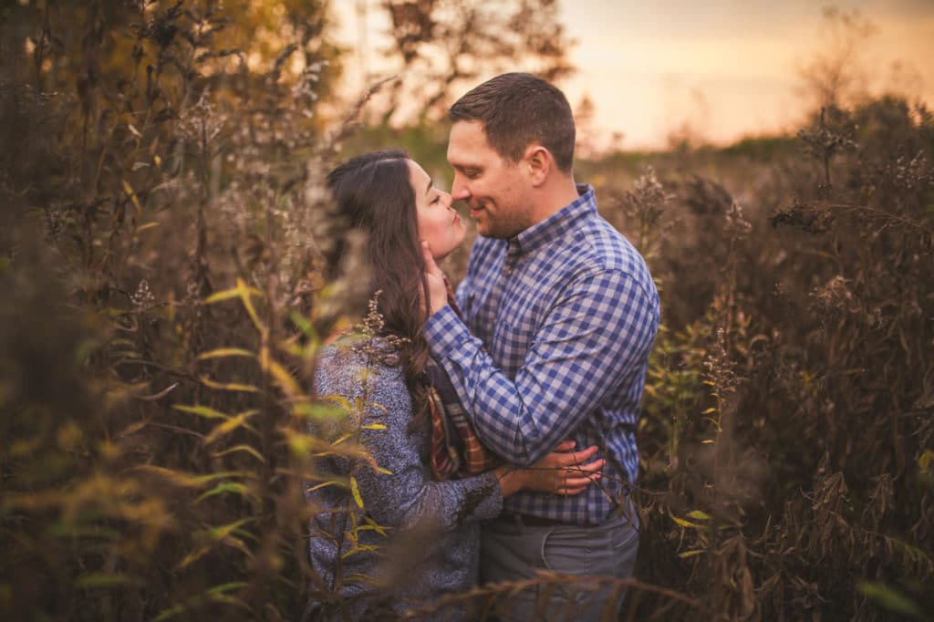 la-crosse-nature-engagement A couple kisses during their Millers Bluff engagement session.