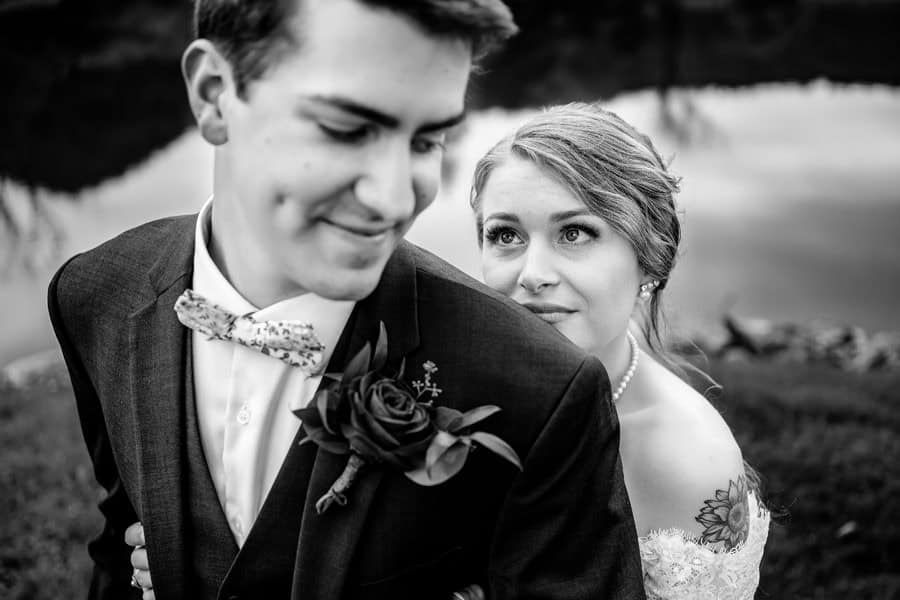 A black and white photo of a bride and groom.