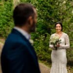 A love-filled backyard wedding in a wooded area, featuring Courtney and James.