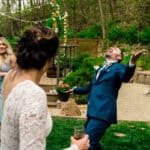 A group of bridesmaids and groomsmen are celebrating at Courtney and James’ love-filled Trempleau wedding.
