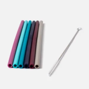 Six REMplenish silicone straws in magenta, aqua, teal, navy, burgundy and stone, with a cleaning brush