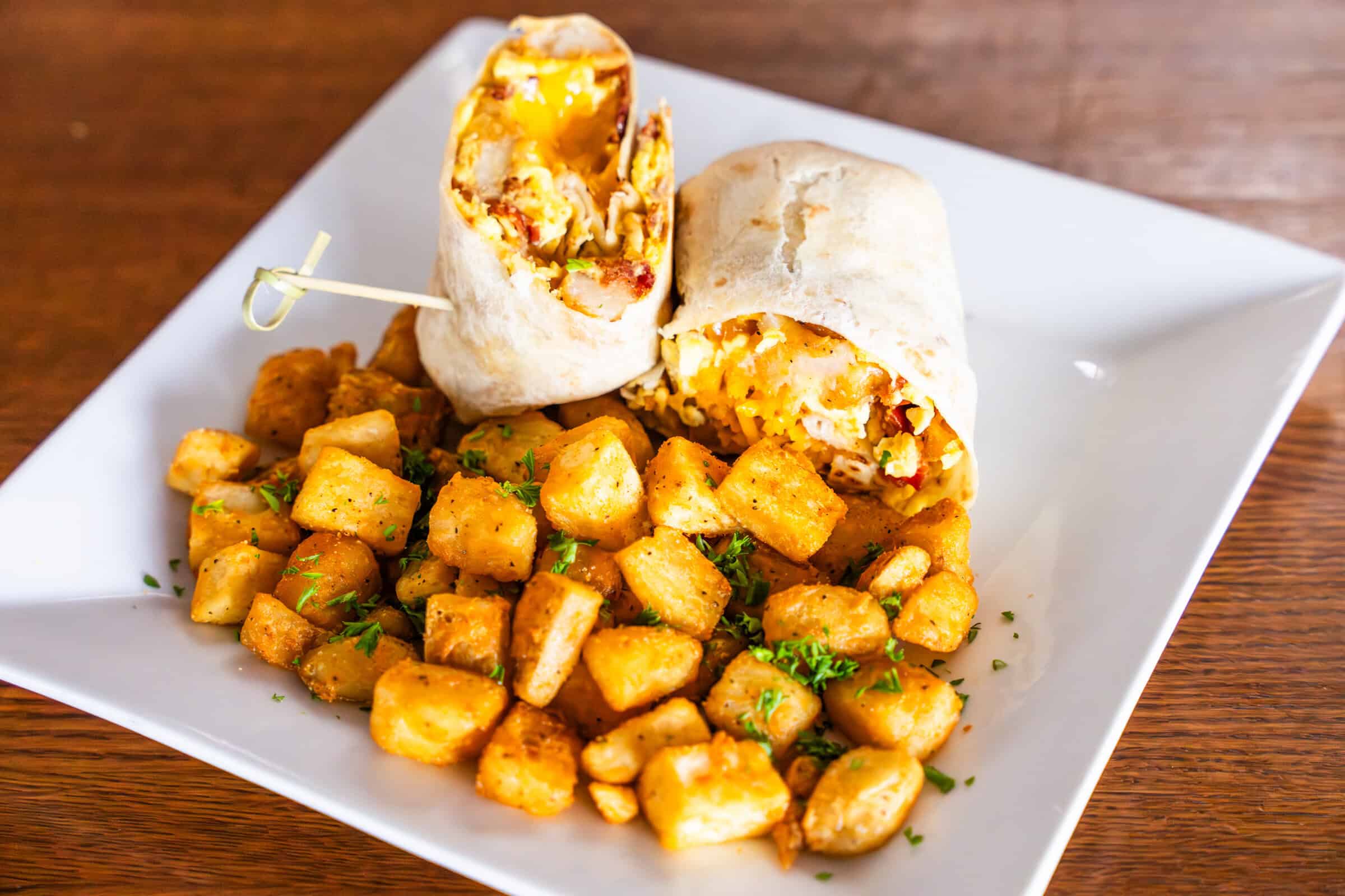 Breakfast burrito and potatoes at The Burger Place Anaheim.