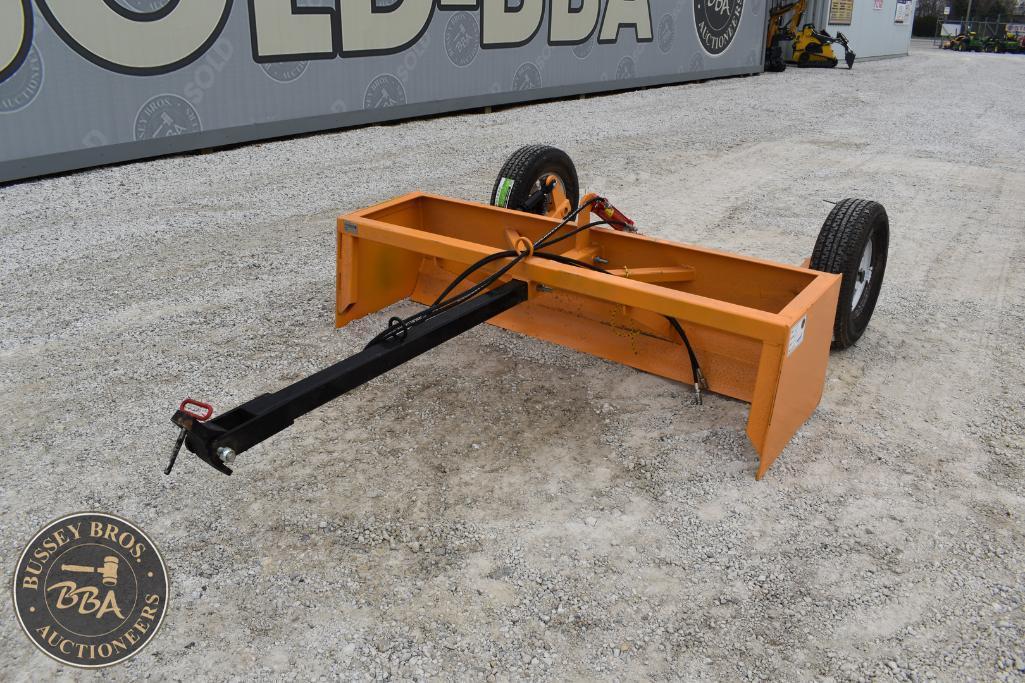 Orange farm equipment trailer with two wheels and towing hitch for agricultural use.