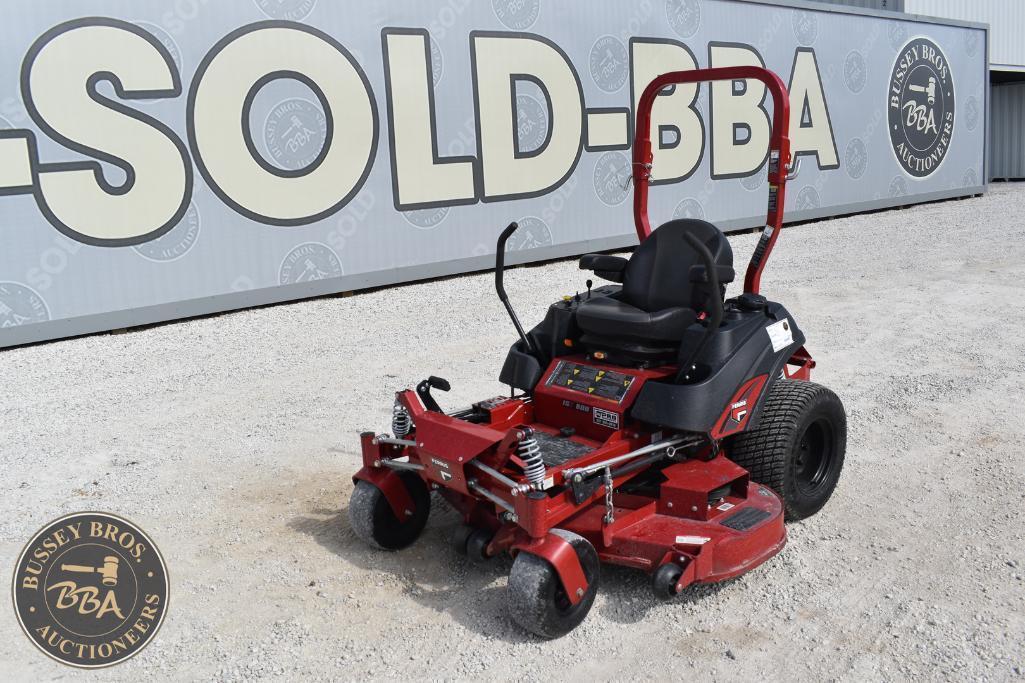 Commercial zero-turn lawn mower displayed at Bussey Bros Auctioneers sale.