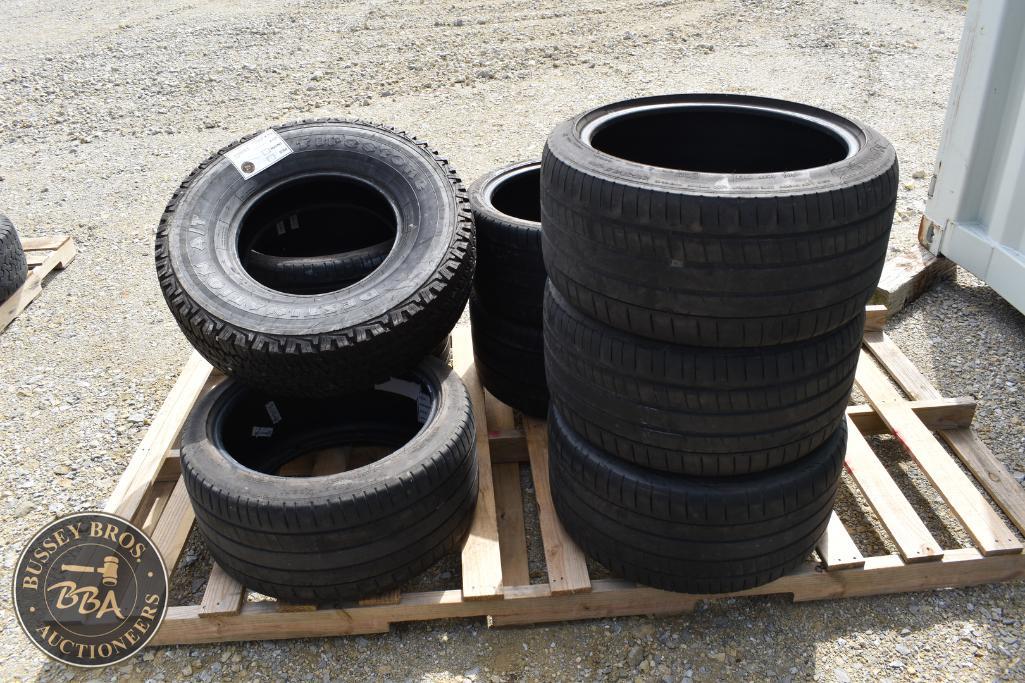 Stacked used tires at Bussey Bros Auction, ready for sale or auction.