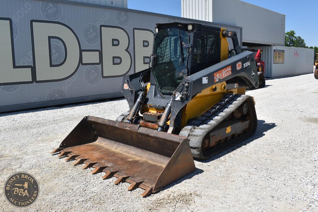 Excavator with a large bucket on tracked machinery at Bussey Bros Auctioneers.