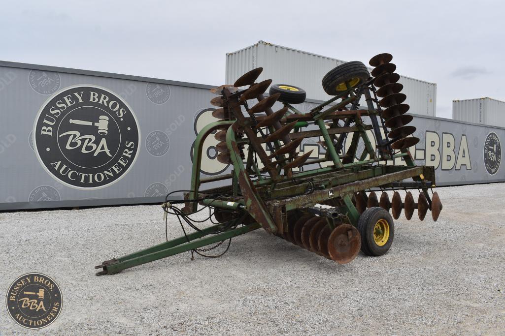 Vintage farm machinery on display at Bussey Bros Auctioneers, specializing in agricultural equipment.