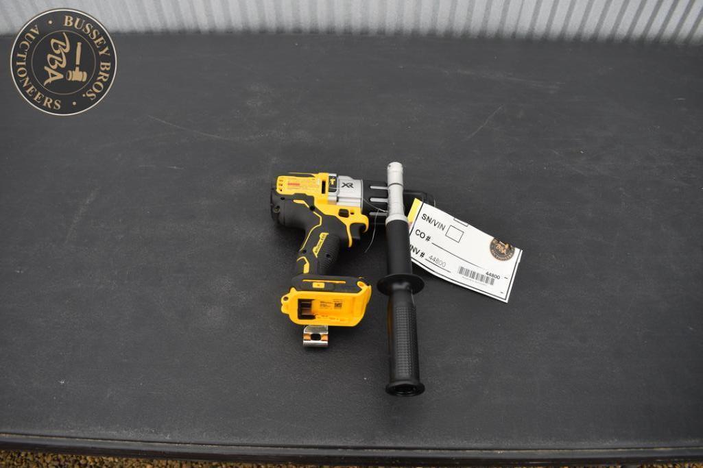 Power drill and handle for auction at Bussey Bros Auctioneers.