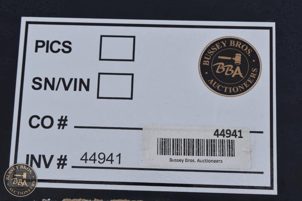 Bussey Bros Auctioneers logo on auction lot tag with barcode and lot details.