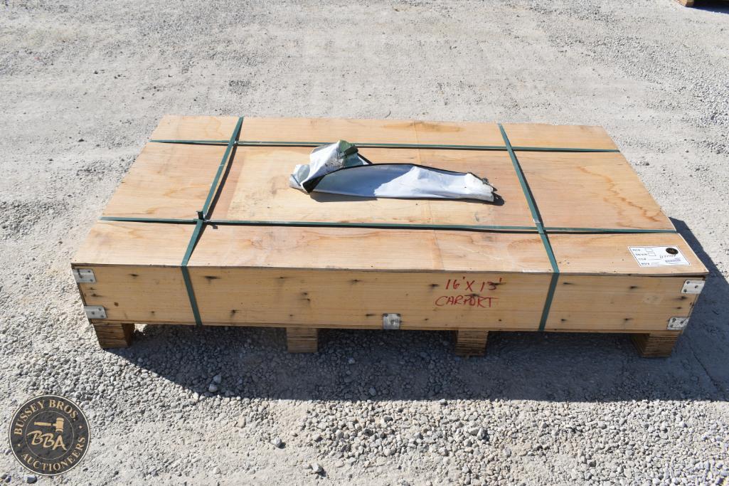 Wooden crate with a wrapped item, likely for auction at Bussey Bros Auctioneers.