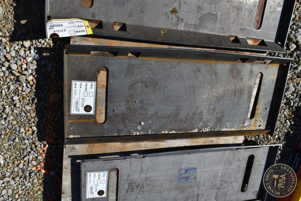 Heavy-duty metal storage containers for auction at Bussey Bros Auctioneers.