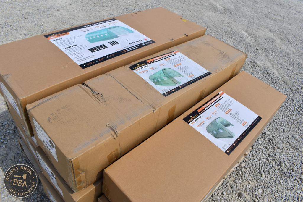 Cardboard boxes with auction items ready for transport at Bussey Bros Auctioneers.