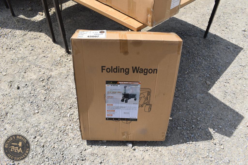 Folding wagon in box at Bussey Bros Auctioneers, ideal for outdoor activities and transport.
