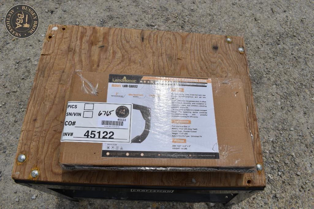 Wooden crate with shipping label for auction item at Bussey Bros Auctioneers.