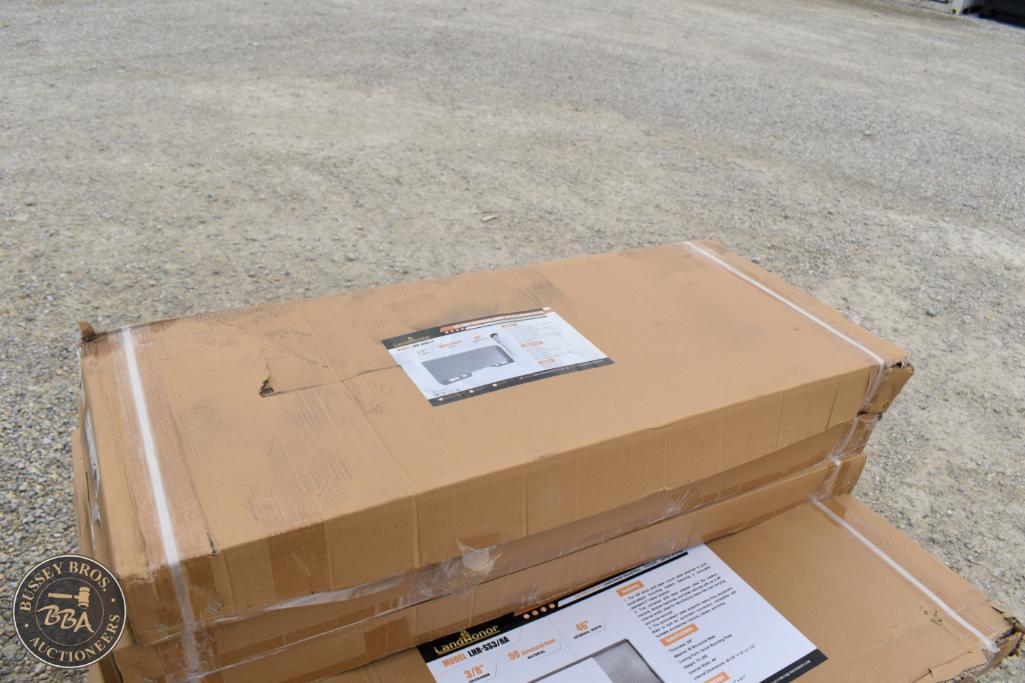 Large cardboard boxes prepared for auction at Bussey Bros Auctioneers.