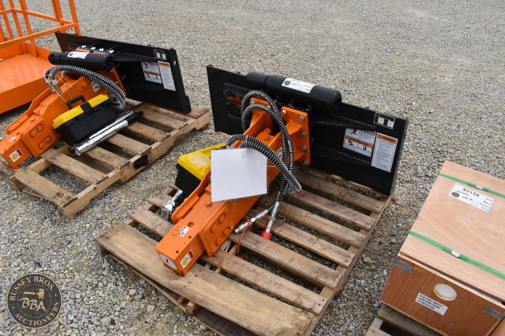Industrial hydraulic attachments for construction equipment at Bussey Bros Auctioneers.