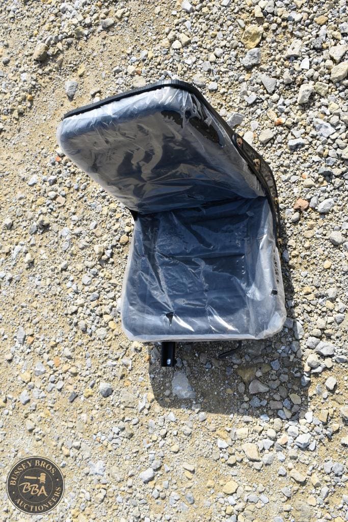 Portable black soft-sided cooler bag for outdoor use, ideal for camping, picnics, and travel.