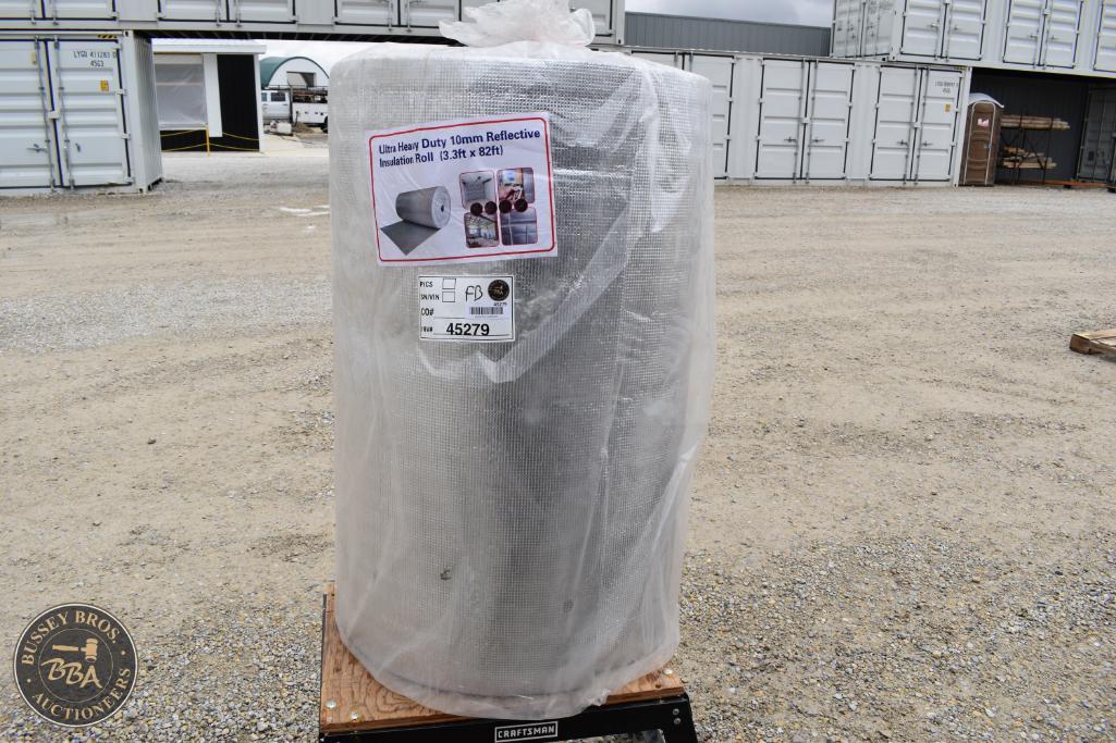 Heavy-duty reflective dump bin wrapped in protective plastic at Bussey Bros Auctioneers.