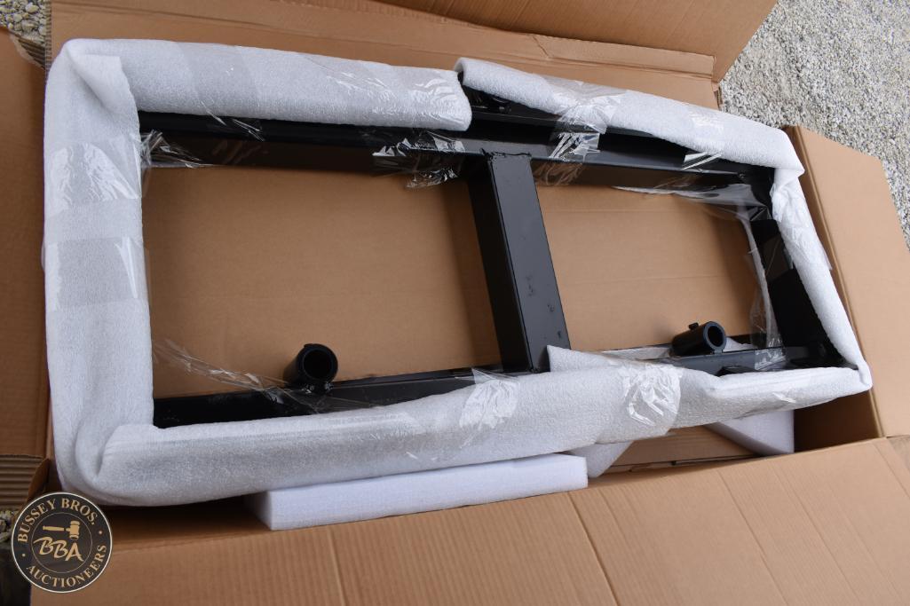 New black furniture legs in packaging for sale at Bussey Bros Auctioneers.