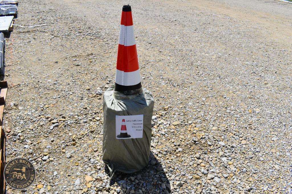 Traffic cone with sandbag weight for safety at Bussey Bros Auctioneers.
