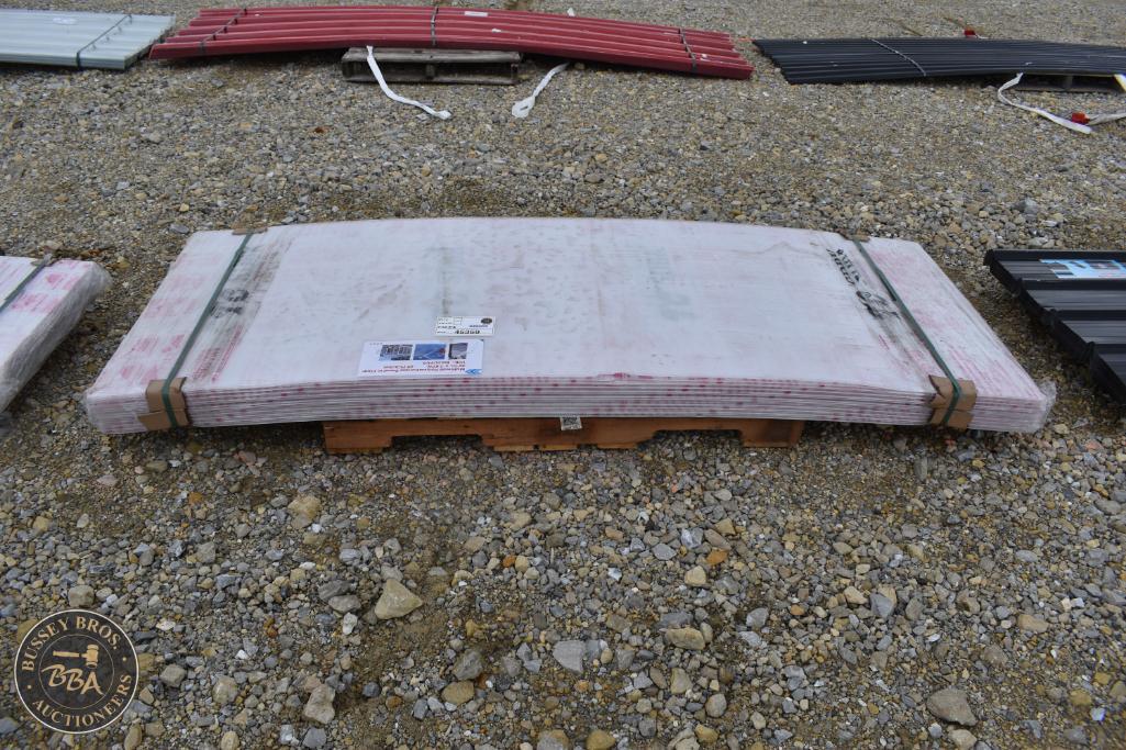 Large white marble slab on wooden pallet for auction at Bussey Bros Auctioneers.