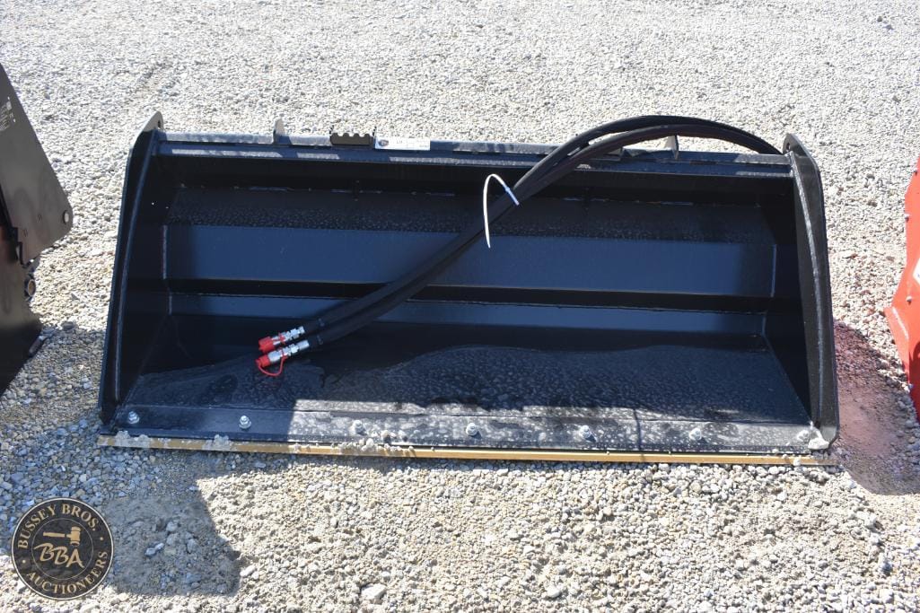 Heavy-duty excavator bucket with hydraulic hoses, ideal for construction and demolition projects.