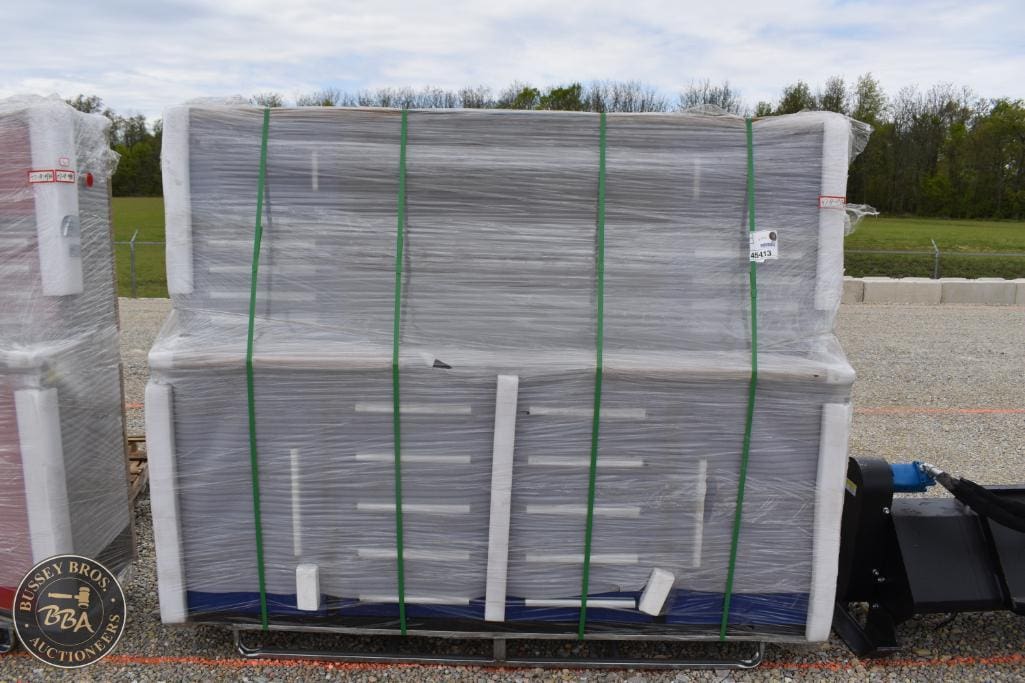 Pallet of construction materials wrapped securely for transport and sale.