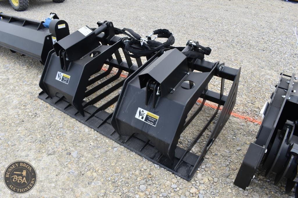 Excavator bucket attachments displayed at Bussey Bros Auctioneers.