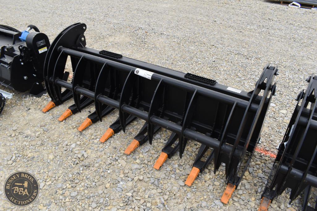 Loader attachment for agricultural machinery at Bussey Bros Auctioneers.