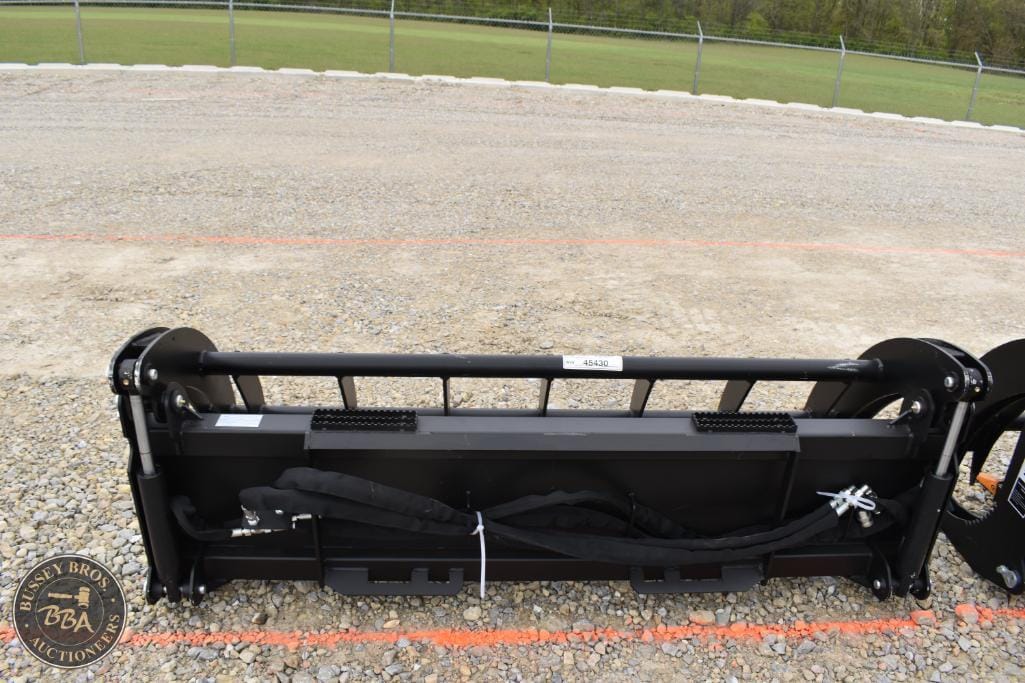 Agricultural implement attachment for farming equipment at auction.