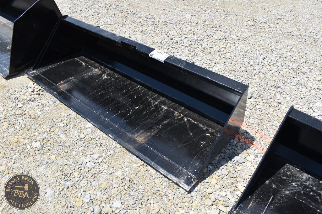 Heavy-duty black metal bucket for construction or agricultural use.
