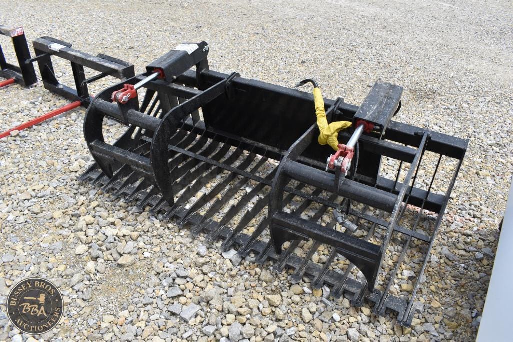 Grapple attachment for excavators, ideal for handling logs, debris, and bulk materials at auctions a.
