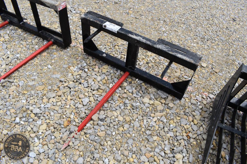 Forklift attachments for construction and agricultural use at Bussey Bros Auctioneers.