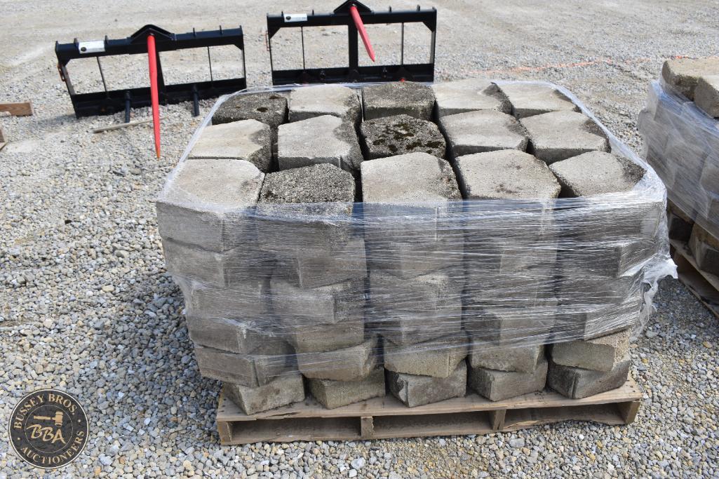Pallet of stone paving blocks for sale at Bussey Bros Auctioneers.