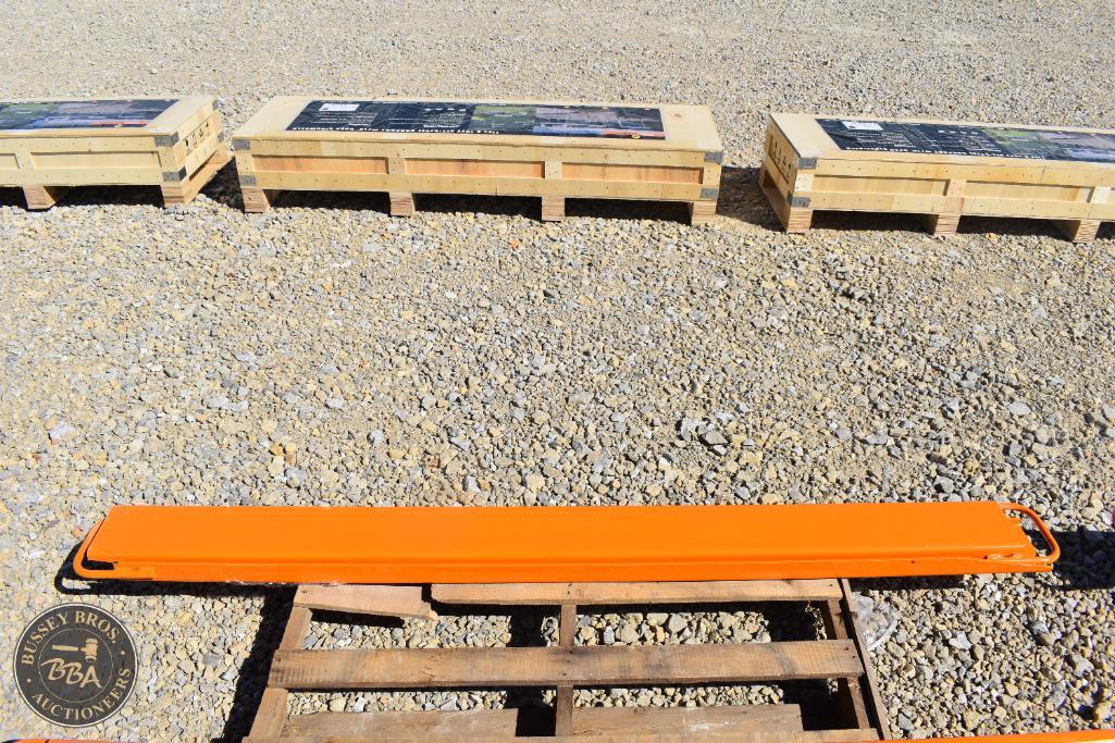 Lifting beam for industrial use, orange color with wooden support, suitable for construction or heav.
