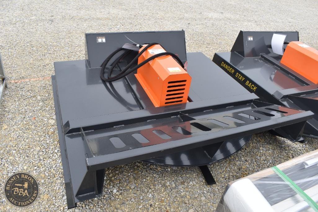 Industrial cutting machine with safety features for construction use.