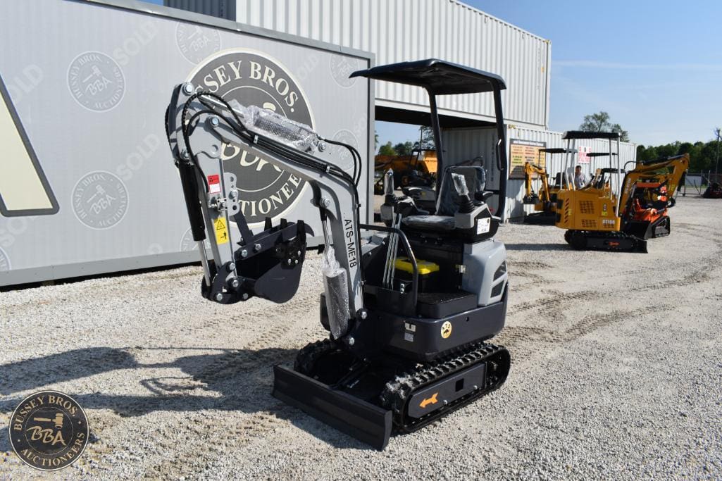 Mini excavator with compact design and versatile functionality. Ideal for construction and landscapi.