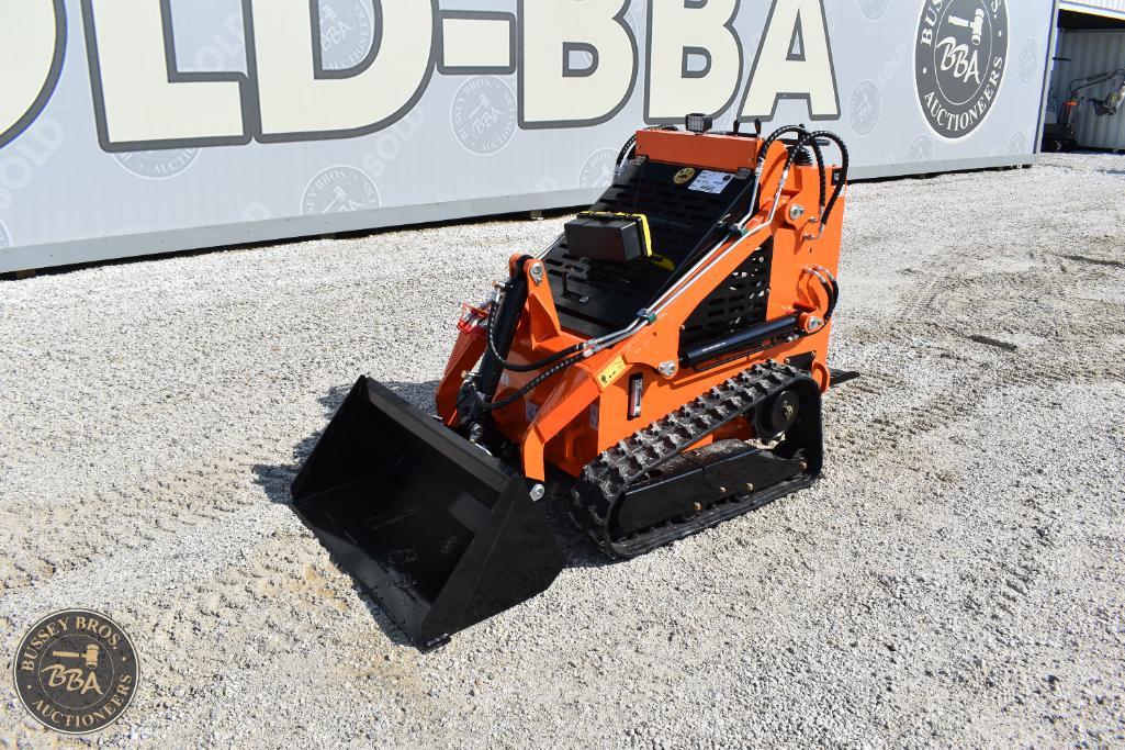 Mini skid steer loader with orange and black design, compact size, and rubber tracks for versatile c.