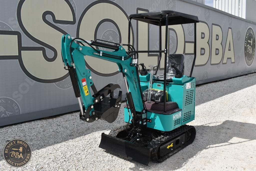 Mini excavator on display at Bussey Bros Auctioneers, ideal for construction and landscaping project.