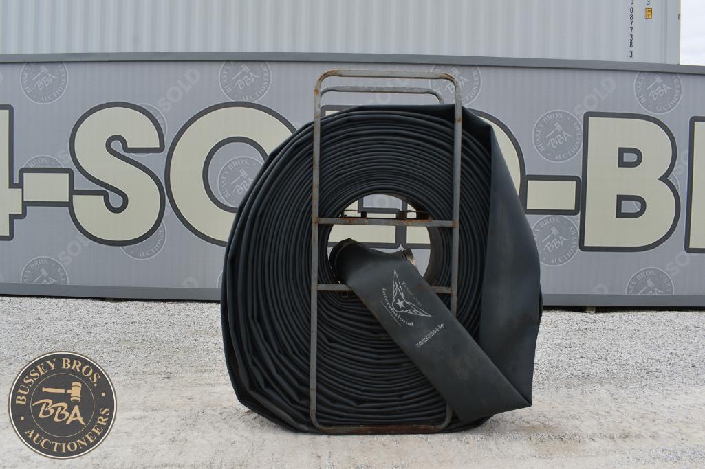 Coiled black industrial hose on metal cart at Bussey Bros Auctioneers.