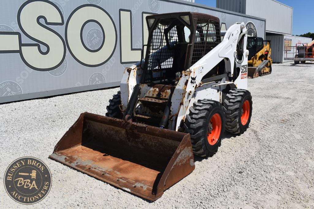 Construction loader with bucket attachment, used for earthmoving and construction projects.
