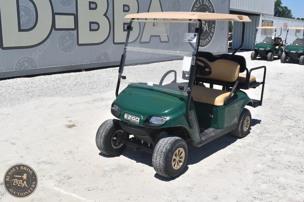 Golf cart used for transportation at Bussey Bros Auctioneers auction yard.