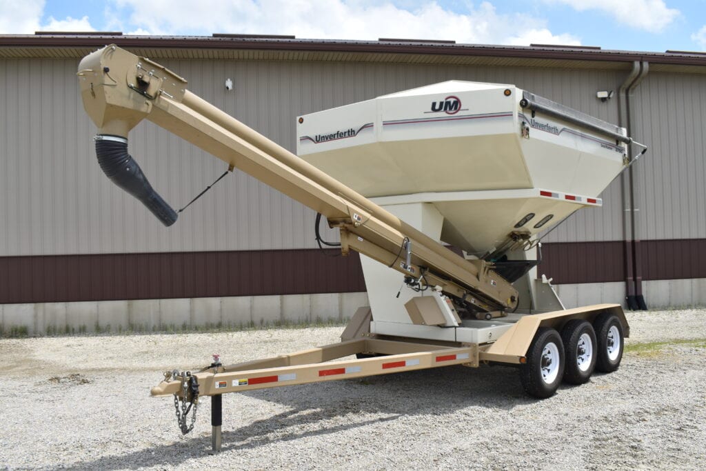 Portable grain auger on trailer for farm use at auction.