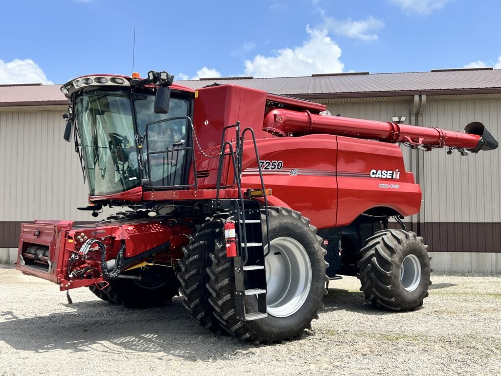 Red Case IH combine harvester at Bussey Bros Auctioneers event.