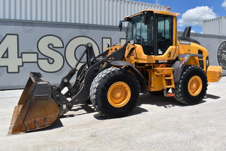 Yellow loader with bucket attachment at Bussey Bros Auction site.