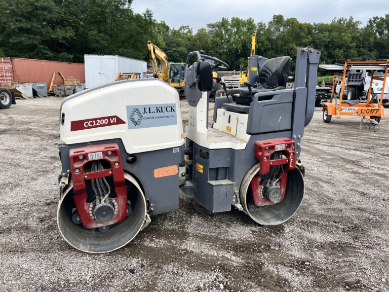 Compact road roller with J.L. Kuck branding for construction use.